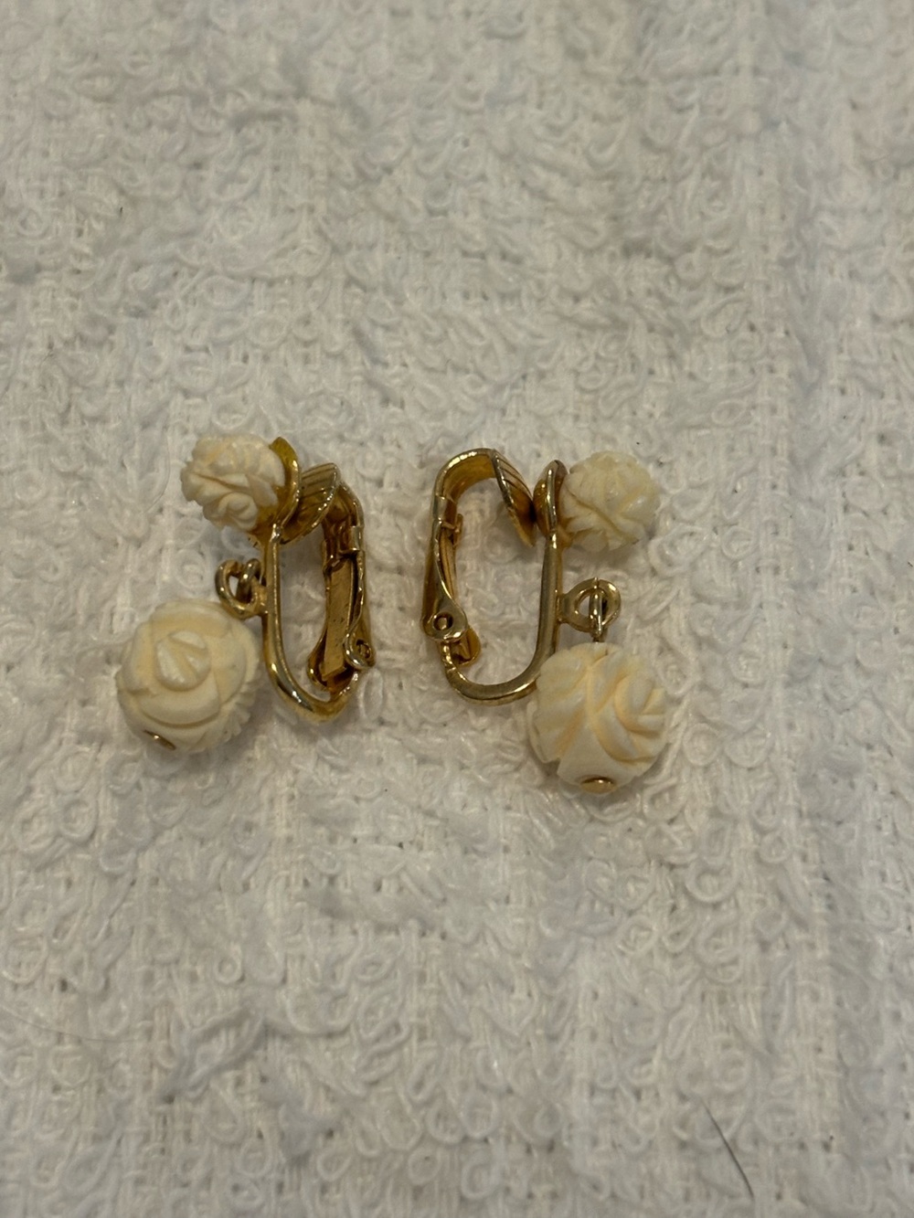 Vintage celluloid clip on rose bud earrings